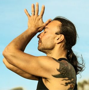 A close up of Eddy Toyonaga in meditation