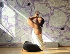 Eddy Toyonaga setting an intention before practicing yoga