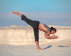Eddy Toyonaga doing a yoga pose in the desert